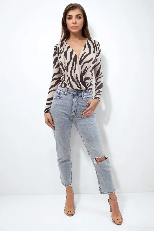 Sleeveless Bodysuits for a Cool and Casual Summer LookDANI ZEBRA ANIMAL PRINT BODY WITH LONG SLEEVES