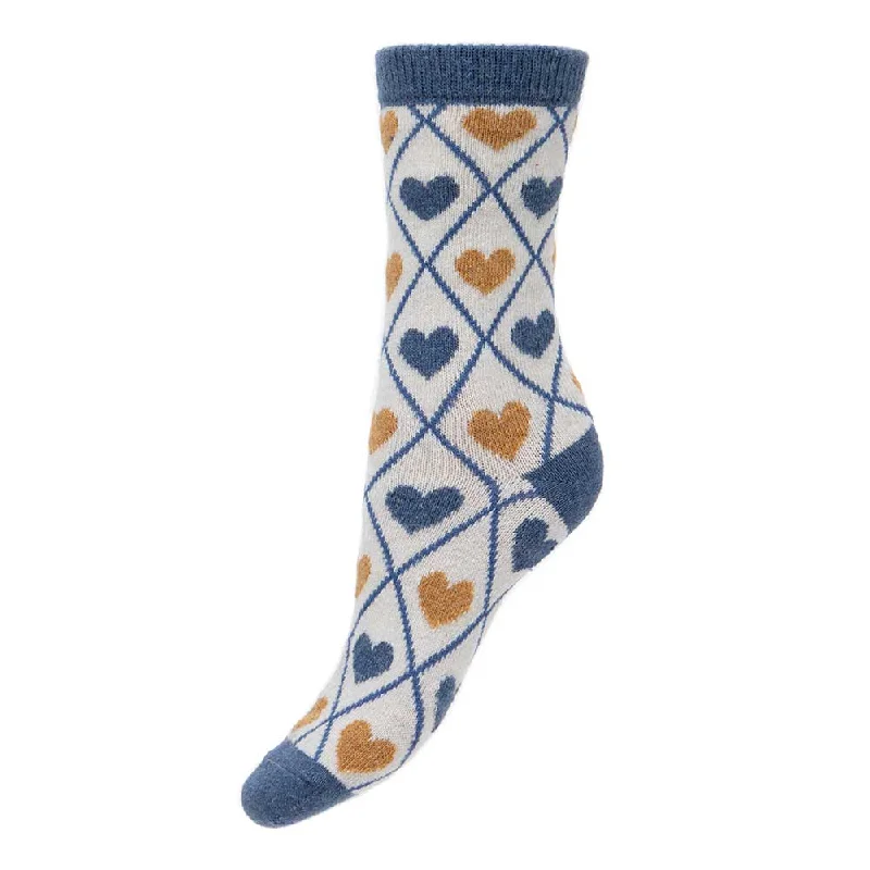 Women's argyle - patterned thigh - high socksCream wool blend socks with blue criss cross and hearts