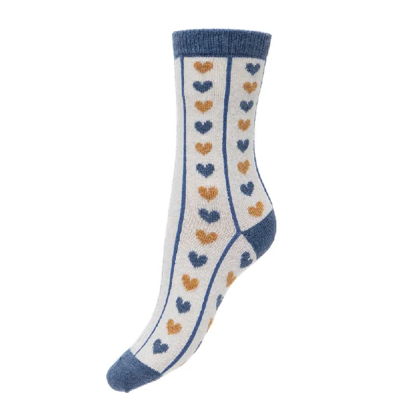 Women's ribbed knee - high socks for a classic lookCream wool blend socks with blue lines and hearts